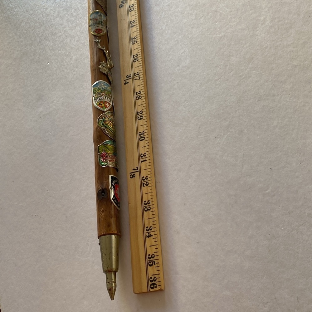 German Collectible Wooden Walking Stick with 30 Badges 36” Long Approximately.